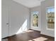 Bright bedroom with hardwood floors, natural light, and modern trim at 118 Via Roma, Woodstock, GA 30188