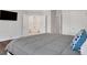 Primary bedroom featuring hardwood floors, neutral walls and ensuite bath at 118 Via Roma, Woodstock, GA 30188