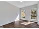 Bright bedroom with hardwood floors, natural light, and modern trim at 118 Via Roma, Woodstock, GA 30188