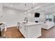 Modern kitchen featuring a large island, stainless steel appliances, and an open floor plan at 118 Via Roma, Woodstock, GA 30188