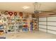 Organized garage with shelving and storage; ready for projects and parking at 104 Summer Chase, Carrollton, GA 30116