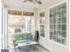 Cozy sunroom with comfortable seating and view of the backyard oasis at 104 Summer Chase, Carrollton, GA 30116