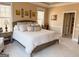 Comfortable main bedroom featuring a neutral color palette and carpeted floor at 8179 Pineview Ct, Villa Rica, GA 30180