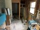 Unfinished basement with exposed framing and construction, with window and exposed utilities at 281 Timber Laurel Ln, Lawrenceville, GA 30043