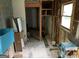 Unfinished basement with exposed framing and construction, with window and exposed utilities at 281 Timber Laurel Ln, Lawrenceville, GA 30043