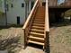 Exterior view of the wooden steps leading to the deck at 281 Timber Laurel Ln, Lawrenceville, GA 30043