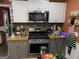 Well-equipped kitchen with modern appliances and ample counter space at 281 Timber Laurel Ln, Lawrenceville, GA 30043