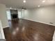 Spacious living room has a fireplace and wood-look floors at 281 Timber Laurel Ln, Lawrenceville, GA 30043