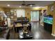 Inviting living room with hardwood floors, aquarium, and ample natural light at 281 Timber Laurel Ln, Lawrenceville, GA 30043