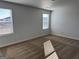 Bright bedroom with neutral carpet and natural light at 1224 Hibiscus Way, Mcdonough, GA 30253