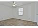 Clean bedroom with laminate floors, a bright window, and ample natural light at 5938 Rock Ct, Union City, GA 30291