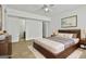 Staged bedroom with modern decor, attached bathroom and neutral colors at 5938 Rock Ct, Union City, GA 30291