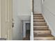Entryway with wood-look stairs and a view to the lower level at 5938 Rock Ct, Union City, GA 30291