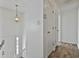 Bright hallway featuring neutral colors with a decorative hanging light at 5938 Rock Ct, Union City, GA 30291
