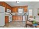 Cozy kitchen featuring a dining nook and wood cabinets for a rustic design at 5938 Rock Ct, Union City, GA 30291