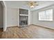 Bright and open living room with a stunning stone fireplace at 5938 Rock Ct, Union City, GA 30291