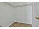 Simple walk-in closet with laminate flooring, basic shelving, and room for storage at 5938 Rock Ct, Union City, GA 30291