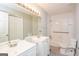 Bathroom features double sinks, a large mirror, and a shower-tub combo at 117 Parkway Ct, Dallas, GA 30157