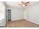 A bedroom with carpeted floors, closet, and a window at 117 Parkway Ct, Dallas, GA 30157
