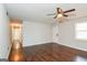 Living room with hardwood floors leading to other rooms at 117 Parkway Ct, Dallas, GA 30157