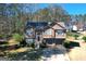 Charming two-story home with a well-manicured lawn and a two-car garage, perfect for suburban living at 1630 Versailles Sw Dr, Atlanta, GA 30331