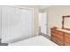 This bedroom has closet access, and a window for natural light at 220 Melrose Way, Mcdonough, GA 30252