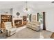 Inviting living room featuring a cozy fireplace and comfortable seating at 220 Melrose Way, Mcdonough, GA 30252