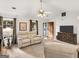 Comfortable living room with plush seating, natural light, and inviting decor at 220 Melrose Way, Mcdonough, GA 30252