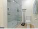 Modern bathroom showcasing a glass-enclosed shower and updated fixtures at 170 Majesty Ln, Fayetteville, GA 30215