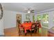 Traditional dining room with wood floors, table set, and access to the outdoor deck at 170 Majesty Ln, Fayetteville, GA 30215