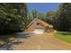 Brick home with a two-car garage and spacious driveway at 170 Majesty Ln, Fayetteville, GA 30215