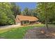 Well-maintained brick home with a two-car garage and landscaped yard at 170 Majesty Ln, Fayetteville, GA 30215