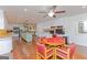 Eat-in kitchen features a breakfast table, kitchen island, and custom white cabinetry at 170 Majesty Ln, Fayetteville, GA 30215
