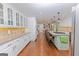 Spacious kitchen with granite countertops, a large island with seating, and ample cabinetry at 170 Majesty Ln, Fayetteville, GA 30215