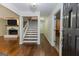 Spacious entryway with hardwood floors and staircase at 170 Majesty Ln, Fayetteville, GA 30215