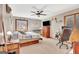 Bright bedroom with neutral walls, ceiling fan, a bed, and a work desk at 106 Robinson Bend Trl, Peachtree City, GA 30269