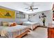 Bedroom with sports themed posters, carpeted floors and two beds at 106 Robinson Bend Trl, Peachtree City, GA 30269
