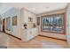 View of the dining area featuring a window and wooden trim, a perfect spot for Gathering gatherings at 106 Robinson Bend Trl, Peachtree City, GA 30269
