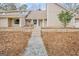 Welcoming front porch with charming rocking chairs and decor at 106 Robinson Bend Trl, Peachtree City, GA 30269