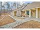 Charming porch with rocking chairs and decorative angel statue at 106 Robinson Bend Trl, Peachtree City, GA 30269