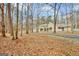 Home with unique architecture and landscaping, nestled among trees at 106 Robinson Bend Trl, Peachtree City, GA 30269
