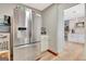 View of the kitchen featuring a stainless-steel refrigerator and access to a pantry and the kitchen area at 106 Robinson Bend Trl, Peachtree City, GA 30269