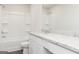 Bright bathroom featuring a tub-shower combo with white tile and a granite vanity at 1048 Claas Way, Locust Grove, GA 30248