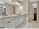 Spacious bathroom with double vanity, granite countertops, and a walk-in closet at 339 Cottonwood Cir, Peachtree City, GA 30269