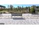 Beautiful community area with a pergola, outdoor fireplace, and comfortable seating at 339 Cottonwood Cir, Peachtree City, GA 30269