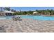 Stunning community pool with ample seating and a covered dining area at 339 Cottonwood Cir, Peachtree City, GA 30269