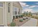 Close-up view of the front exterior with manicured landscaping and a well-maintained facade at 339 Cottonwood Cir, Peachtree City, GA 30269