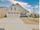 Charming single-Gathering home with a two-car garage, well-manicured lawn, and inviting curb appeal at 339 Cottonwood Cir, Peachtree City, GA 30269