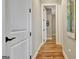 Hallway with hardwood floors with access to other rooms at 339 Cottonwood Cir, Peachtree City, GA 30269