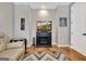 Cozy living room features a TV, fireplace and comfortable seating, perfect for relaxation at 339 Cottonwood Cir, Peachtree City, GA 30269